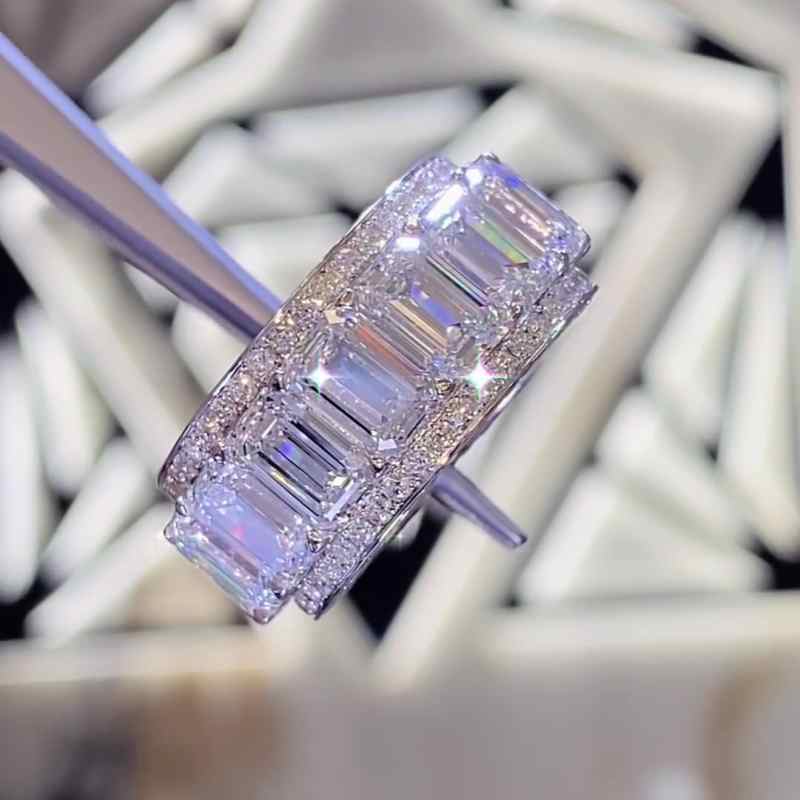 Jorrio handmade gold emerald cut sterling silver wedding band