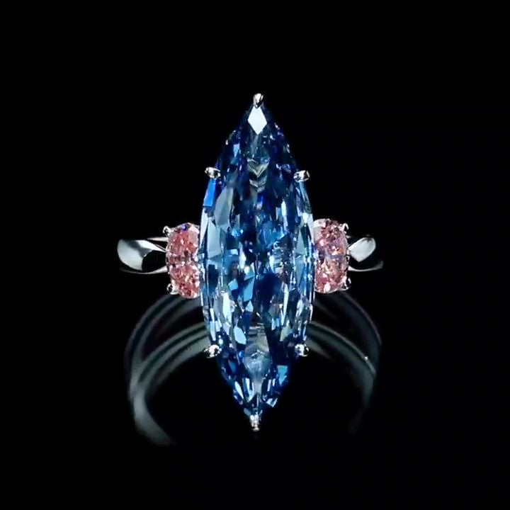 Jorrio handmade L-sapphire marquise cut sterling silver engagement ring