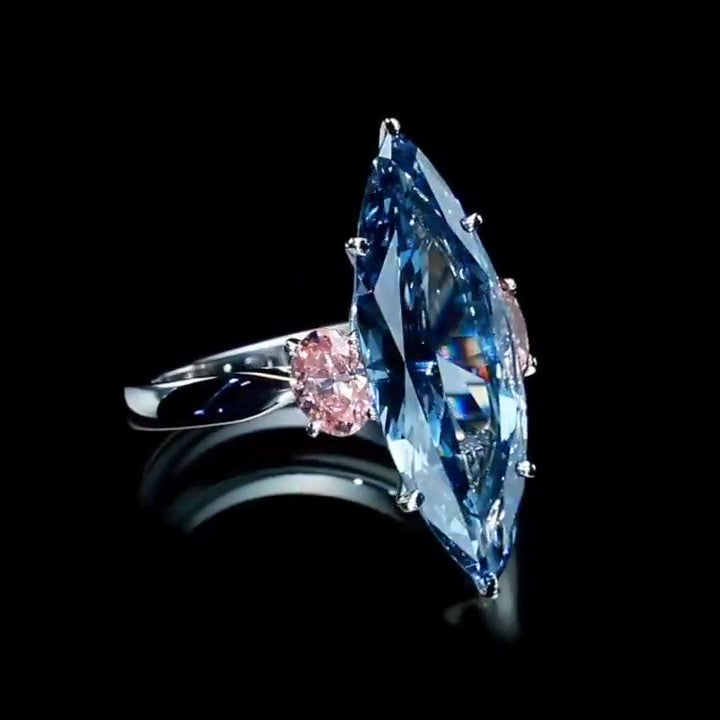 Jorrio handmade L-sapphire marquise cut sterling silver engagement ring