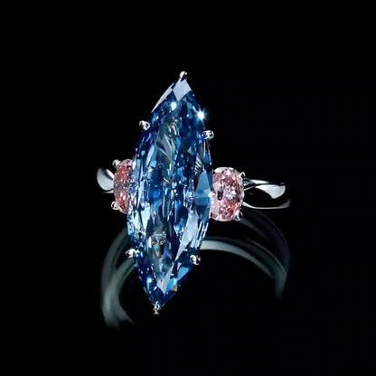 Jorrio handmade L-sapphire marquise cut sterling silver engagement ring